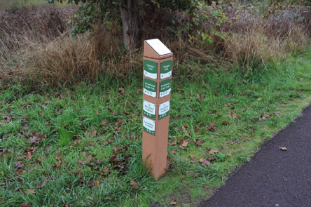 Trail junctions have trail markers with a trail map on top